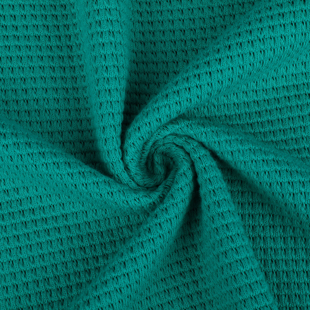 Komfortabel og åndbar strikket enkeltsidet jacquard stof til kvinder